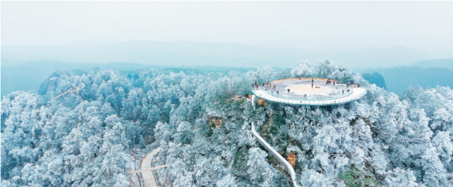 航拍位于明月山山脉中段的五华山旅游区雪景。（邻水县委宣传部供图）